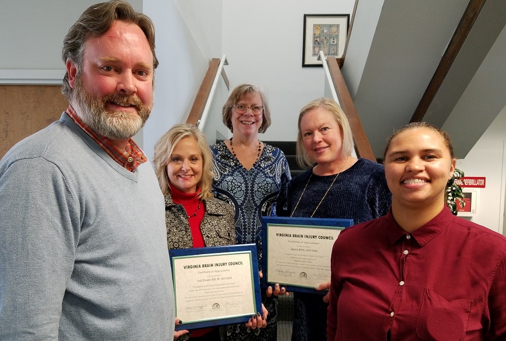 Photo of DARS Commissioner Kathryn  Hayfield thanking outgoing Virginia Brain Injury Council members